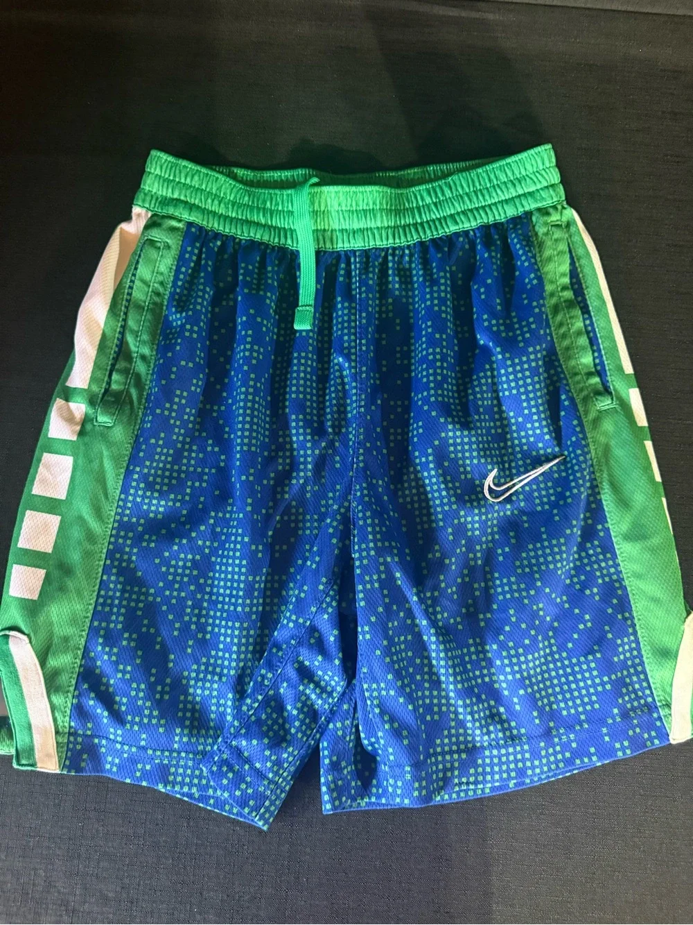 Nike Blue Athletic Shorts with Green Waistband and Panels